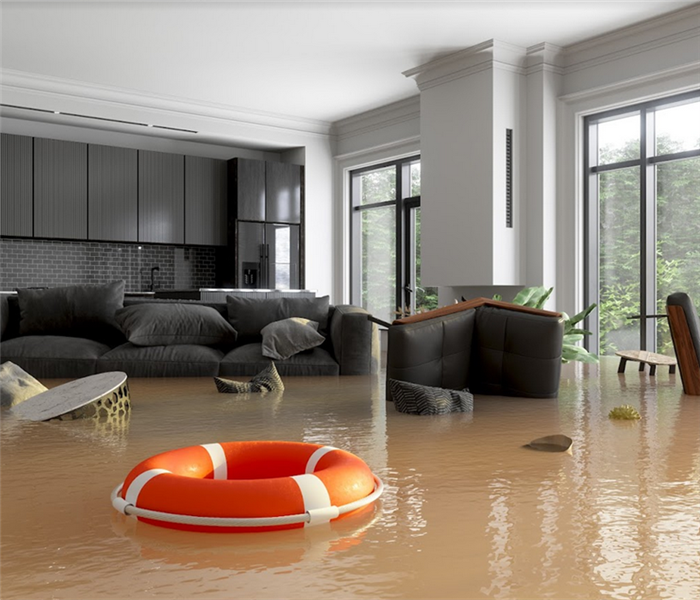 a flooded living room with furniture floating around everywhere